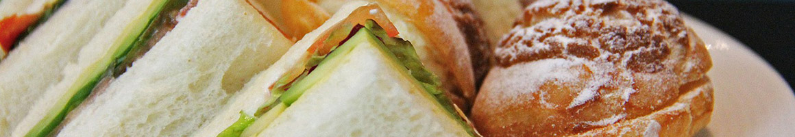 Eating American (New) Sandwich at Coffee Bistro restaurant in Clovis, NM.